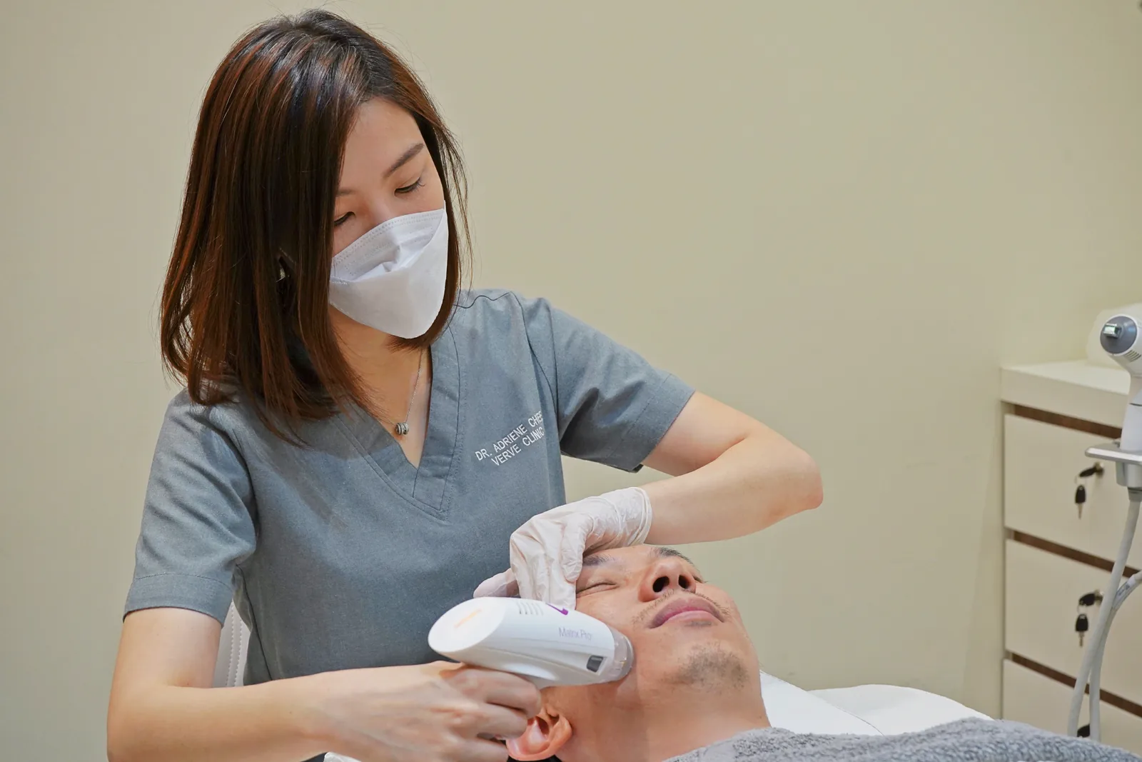 Dr. Adriene Chee treating a male patient with Matrix Pro RF microneedling for skin tightening at Verve Clinic Petaling Jaya