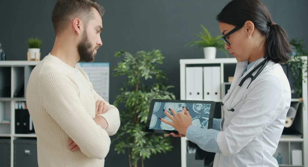 Doctor reviewing hormone blood test results with a patient